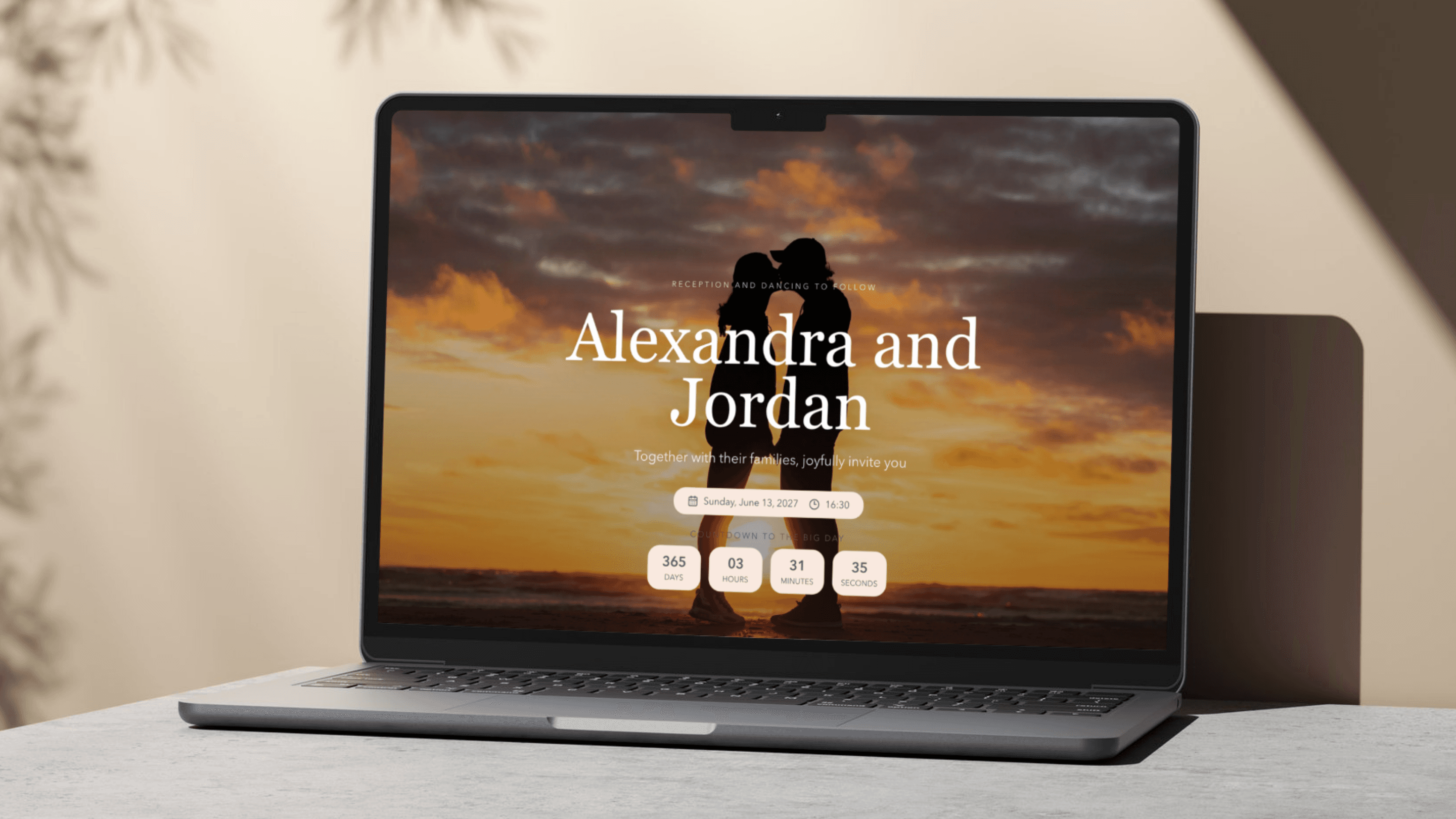 A wedding invite displayed on a laptop screen